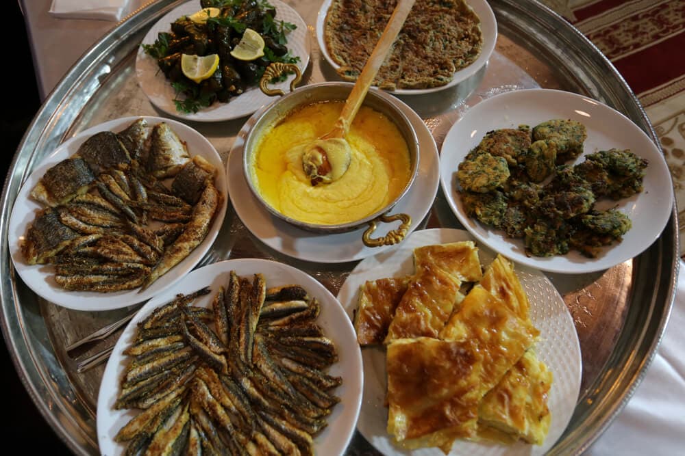 Authentic Black Sea regional banquet with traditional kuymak, fried hamsi, and local delicacies